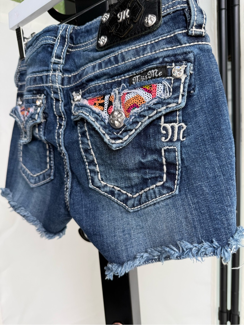 Miss Me Blue Denim Cutoff Shorts with Sequin Pocket Detail